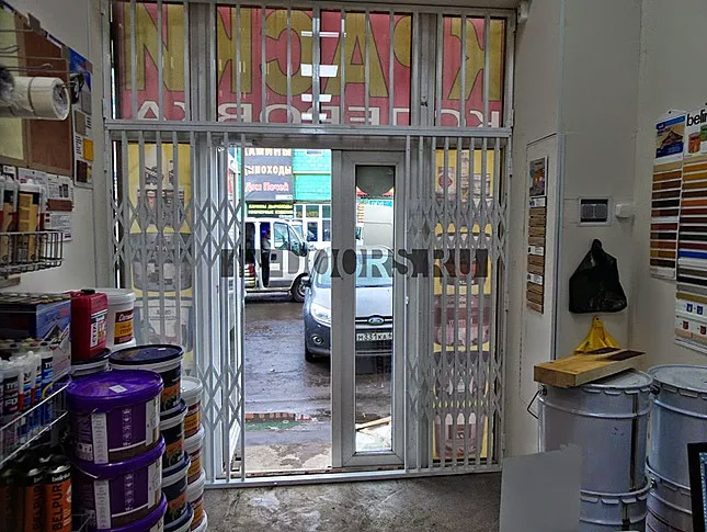 Раздвижная решетка в магазин краски в г.Одинцово 2